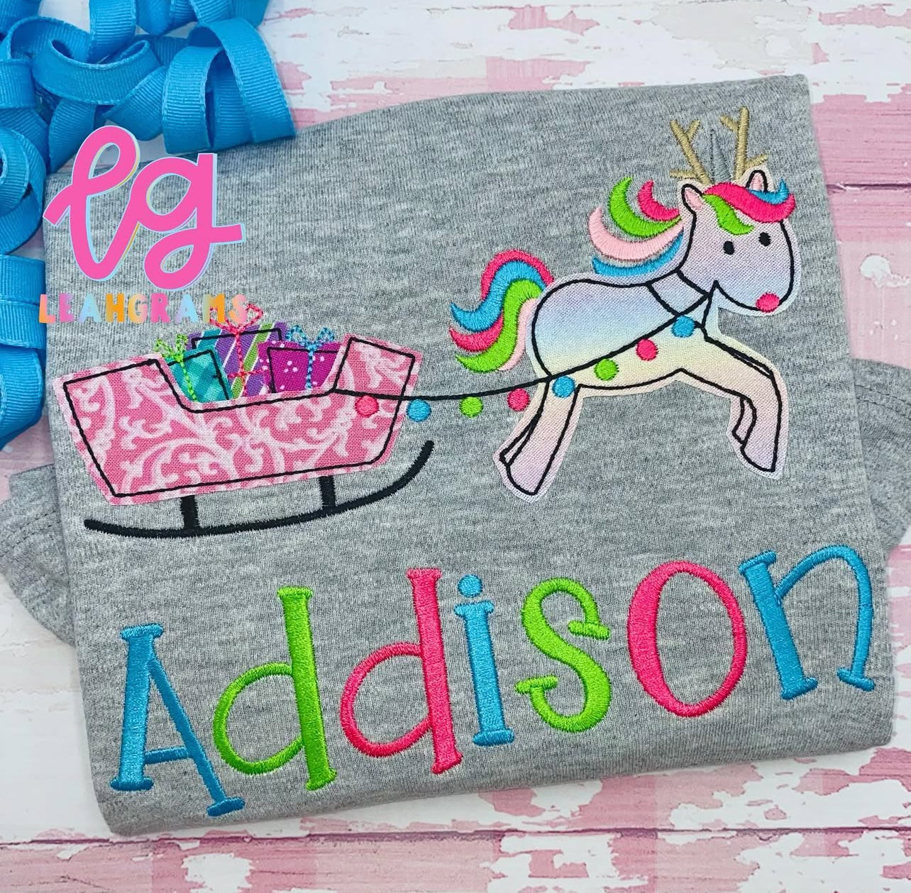 Unicorn-Pulled Sleigh with Name Applique Shirt