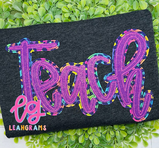 Teach Loop Font Appliqué Shirt